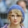 Ir a la foto Taylor Swift con gorro azul
