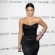 Ir a la foto Kim Kardashian combina el vestido negro con adornos brillantes