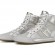 Ir a la foto Zapatillas tipo bota de color plata como tendencia look metalizado en la moda primavera verano 2013