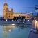 Ir a la foto Vistas nocturnas de la piscina del Hotel Molina Lario, en Málaga