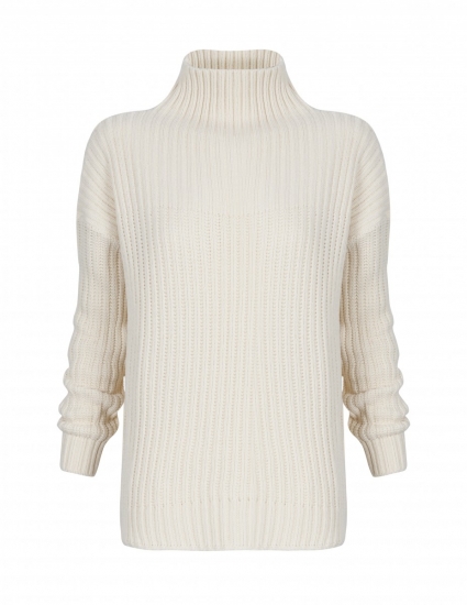 Foto Los jerseys son una de las prendas básicas de este invierno 2014 y con los que podrás crear estilosos looks de lluvia