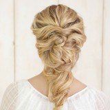 Las trenzas deshechas, perfectas y siempre de moda como peinado de novia
