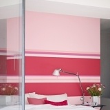 Pinta la pared del cabecero en tonos rojos y rosas para crear un efecto romántico y seductor a la vez