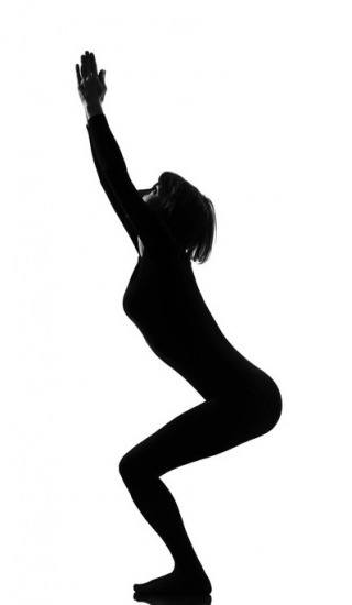 Foto Postura de yoga utkatasana